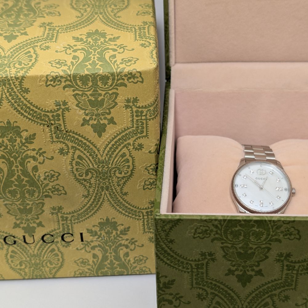 Gucci G Timeless MOP and Diamond dial in Unworn Condition