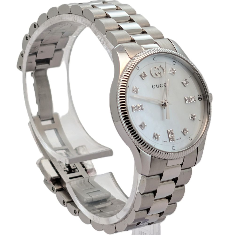 Gucci G Timeless MOP and Diamond dial in Unworn Condition